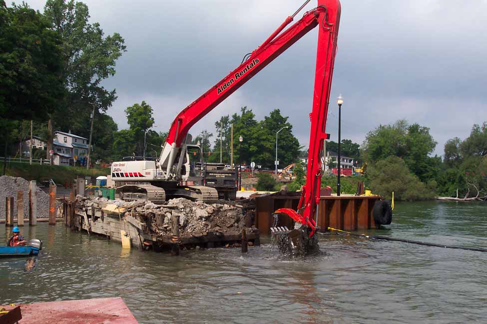 Removal of existing finger pier within turbidity containment curtain